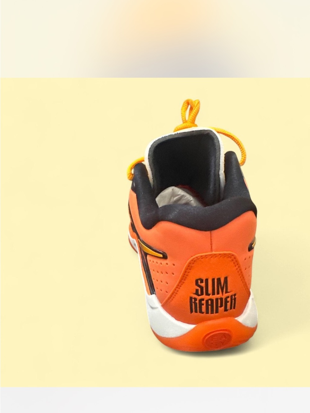 Nike Orange and Black Basketball Shoe with Yellow Swoosh. unisex shoes - Picture 4 of 5